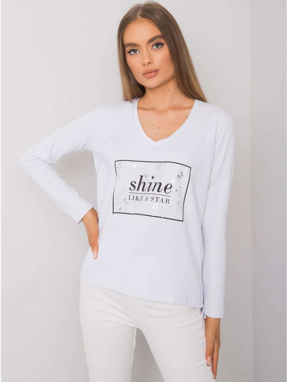 White women's long sleeve shirt with a print